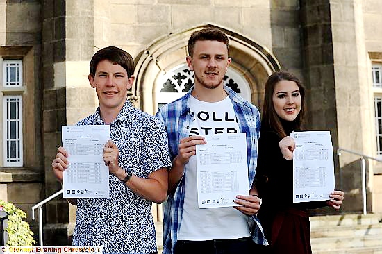 Matthew Cavanagh, Nathan Lowe and Olivia Bescoby collect their results at Blue Coat School