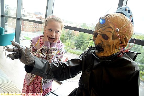 Lauren Crabtree (10) meets Dalek creator Davros at the library