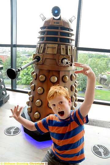 Fred Hulmes (7) with a Dalek. An unfriendly Dalek