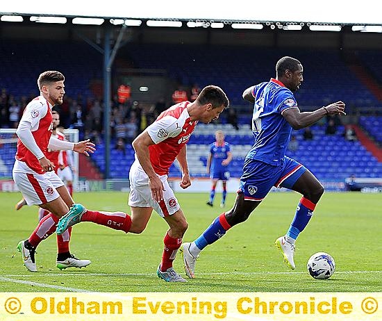 CATCH ME IF YOU CAN . . . Jonathan Forte uses his pace to escape the attentions of two Fleetwood players.