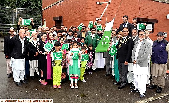 THE Mayor, Councillor Ateeque Ur-Rehman, and Mayoress, Councillor Yasmin Toor, join men, women and children to raise flags at the Pakistani Community Centre to celebrate Pakistan’s independence day