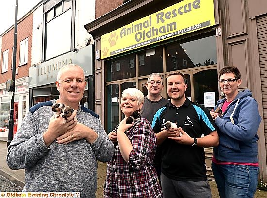 MOVING in . . . (from the left) Animal Rescue Oldham founder and chairman Rod Smith with committee members Tracy Thompson and Ray Hayes, treasurer Scott Woodhead and committee member Mandy Hughes outside the charity’s new base