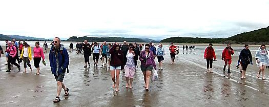 Oldham Athletic fans on Morecambe Bay walk.
