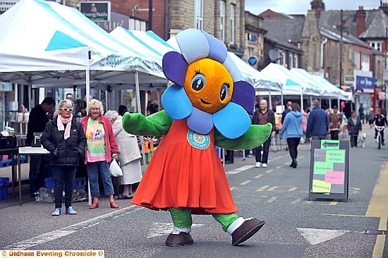 FLOWER power . . . market mascot Blossom
