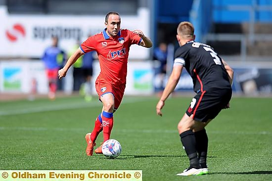 Lee Croft looks for a way into the penalty area