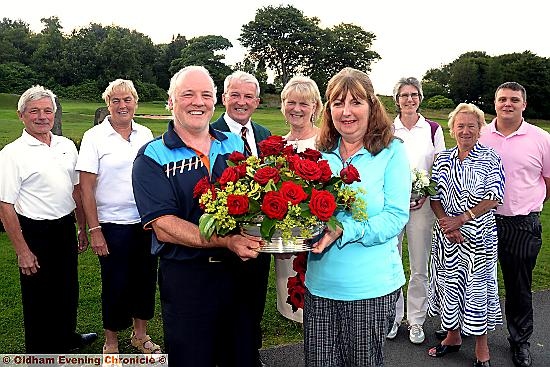 ALL SMILES: the Saddleworth Golf Club Millgate Trophy presentation party - (l-r) runners-up Roy Downing and Sue Booth, winner Vivian Lewis, club president John Moon, lady-captain Pam Tomlinson, winner Lynn Lewis, women’s best gross winner Elaine Clark, Eileen Milne, sponsor for the best gross, and men’s best gross winner Jamie Heywood.