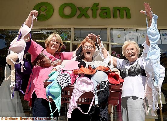 UPLIFTING DONATION: Anne Watson (centre), volunteer deputy manager of Oxfam, is delighted with the generous donation. With her are Vicky Lees (l) and Marjorie Bamforth from Oldham Inner Wheel. 