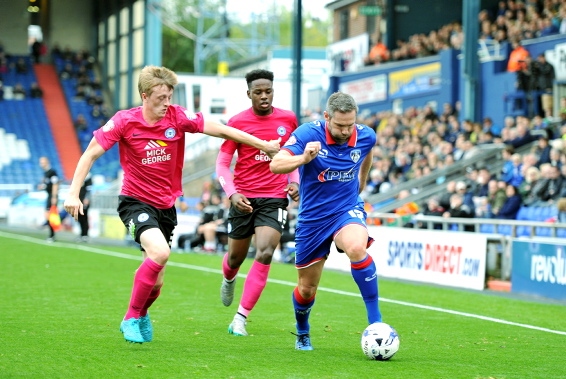 ON THE CHARGE: David Dunn - now caretaker boss - makes a run down the flank. 