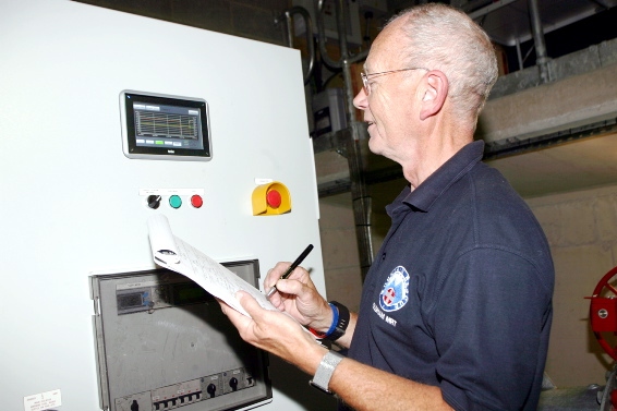 TICKING over . . . Dr Andrew Taylor, Saddleworth Community Hydro member, undertaking the weekly checks
