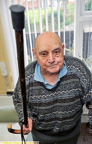 John McLean chased off a burglar with his walking stick.