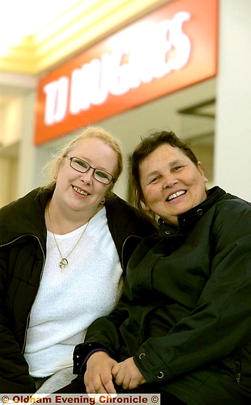 Friends Christine Gerrard (left) and Helena Powell queue to have a look round the new store.
