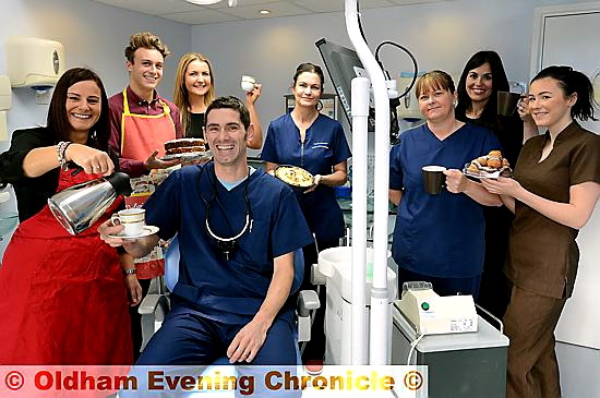 OPEN wide . . . staff at Portman Dental in Grasscroft (from left) Carolina Stoneley, Ben Stoneley, Jessica Knight, Adrian Bennett, Louise Irwin, Kelly Chappel, Tiffany Eglin and Morgan Iball