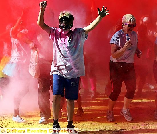 Having a blast . . . runners bring colour to the party