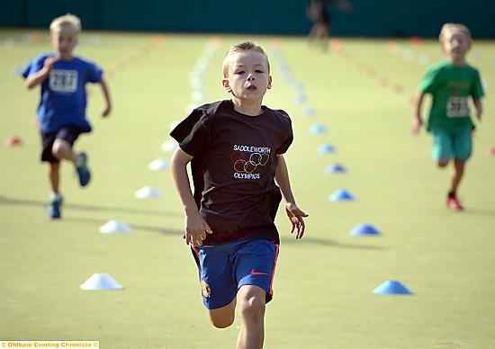 LEADER of the pack . . . Lewis Jagger, of LGFG, wins his 50m sprint heat