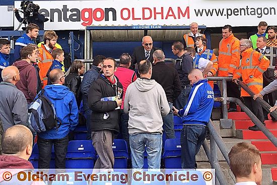 FACE TO FACE . . . Athletic director Barry Owen talks to fans after the Bradford City defeat.
