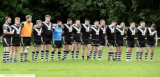 TRIBUTE . . . Saddleworth Rangers players observe a minute’s silence in honour of former club president Chris Grimwood, who died recently. Chris, along-standing patron of Rangers, stood down from the role in 2014 after taking over from Ken Fisher seven years ago.
