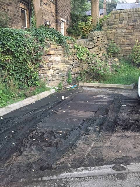 Sara Orritt branded the car parking bays a mud swamp. Picture shows one of the spaces in at the Bakestones project September 2016.
