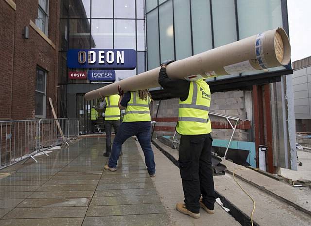 On site at ODEON Oldham as builders put the finishing touches to the cutting-edge cinema due to open in a month's time (Tuesday, October 10th). Today the state-of-the-art ISENSE screen will take pride of place in a 206 seat ISENSE theatre featuring Dolby ATMOS sound.