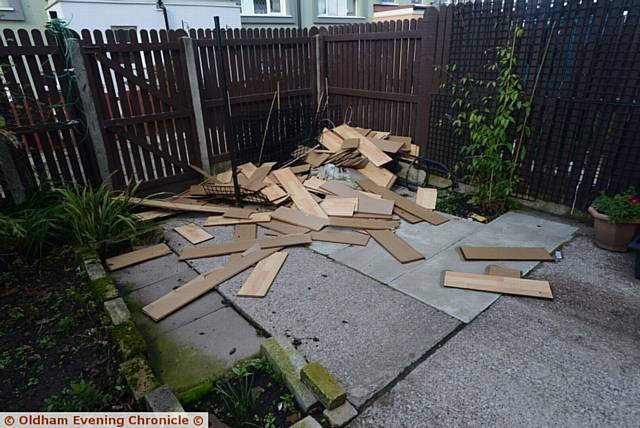 First Choice Homes tenant Toni Johnson, who has only one leg after an operation, had to clear up her own home after a badly-fitted radiator fell off the wall and flooded the property. Pic shows the wooden flooring she removed from her living room.