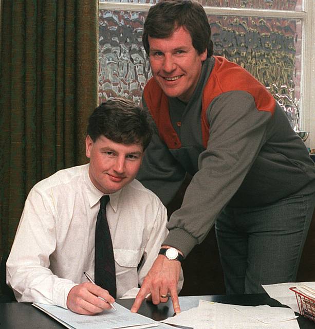 Denis Irwin Signs for Athletic with Joe Royle looking on.86E692.