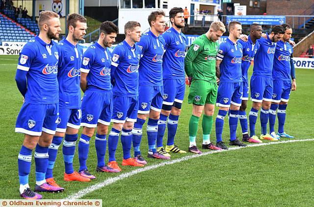 ATHLETIC players gather in remembrance for the fallen