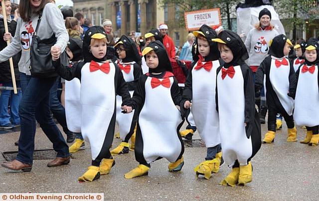 COLOURFUL characters on parade