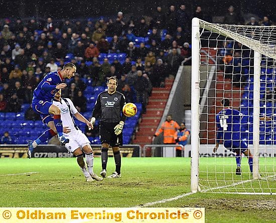 IF ONLY . . . Rhys Murphy slots home what appeared to be a late winner for Athletic, but his effort is ruled out for offside by Timothee Dieng.