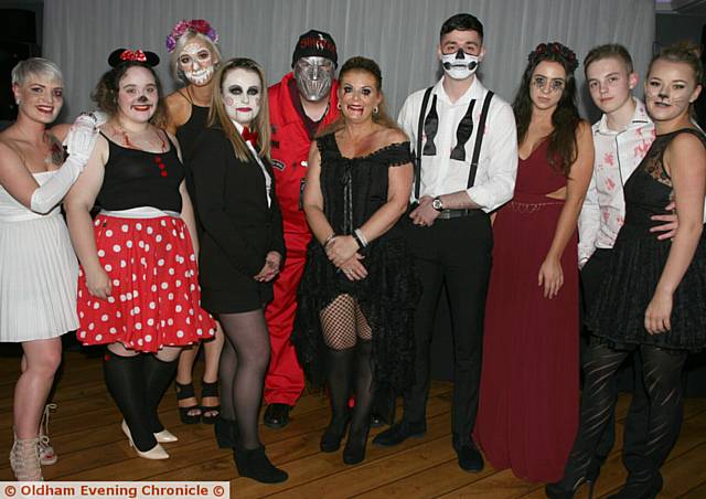 CO-OWNER of Mossley Tax Shop, front row (black jacket), Fiona Heyes, and Yvonne Cookson, (centre front row, black dress) fellow co-owner, at the ball

