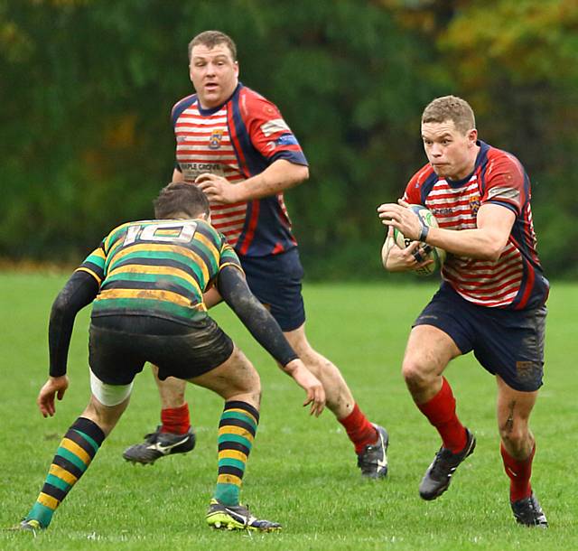 DRIVING FORCE . . . Oldham's Will Mellor attacks the Littleborough defence