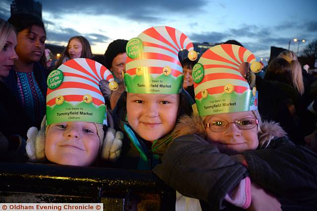 Oldham Christmas Light Switch on. (l-r) Faye Melvin (8), Jennifer Atherton (10) and Sinead Melvin (6).