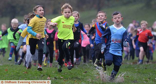 SPLASHING TIMES . . . the girls and boys' Years One and Two race gets under way