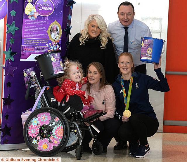 A BIG thanks . . . from left, Millie, mum Emma Clarke, Angela Mullarkey, Andrew Brown store manager and Nicola White