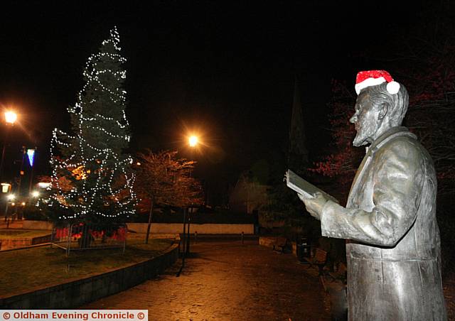 FESTIVE in Failsworth . . . the statue of Ben Brierley complete with Christmas hat