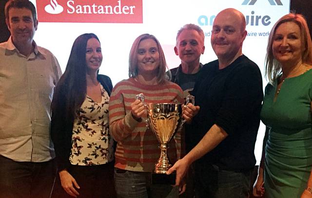 OLDHAM Corporate Quiz winners Innovative Technology. From left, Rob Dolan of sponsor Santander, Melanie Jones, Dayna Patterson, Gareth Owen and Damian Roach, with Pam Pelham of sponsor AMP Wire
