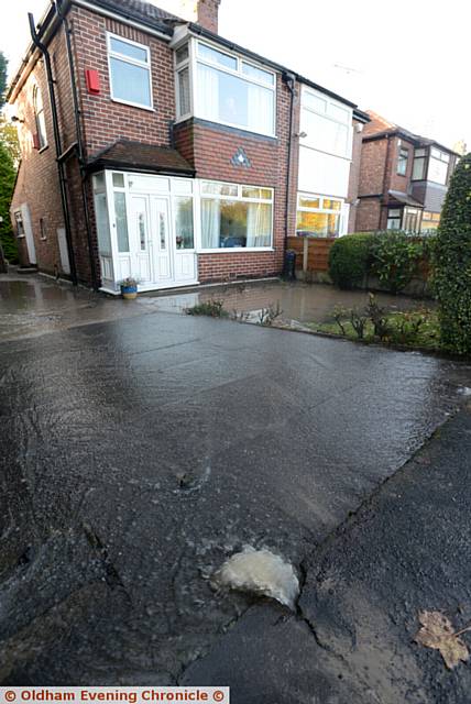 Water burst on Hollinwood Avenue next to the Victoria Hotel.