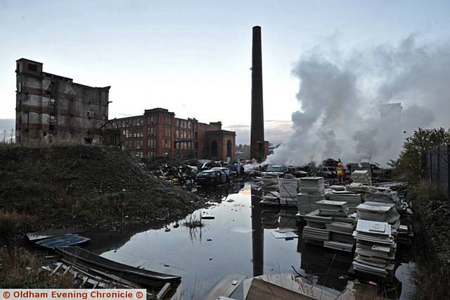 Fire at Maple Mill, Fitton Hill. Dumped vehicles and rubbish affected.