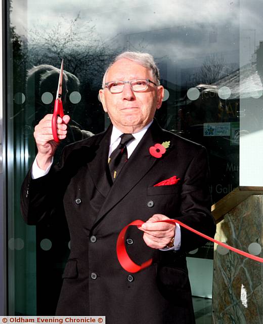 Saddleworth Museum and Gallery, ceremonial opening, Uppermill, Oldham. Sir, Norman Stoller, cutting the ribbon.