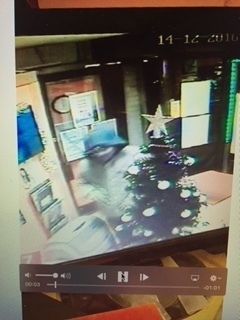 Sunbed shop Armed robbers at Designer Skin, Hollins Road, on December 14. CCTV footage still of the offenders