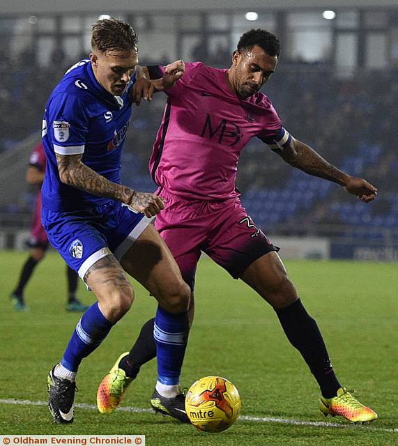 ARM WRESTLE . . . Lee Erwin battles with Anton Ferdinand 
