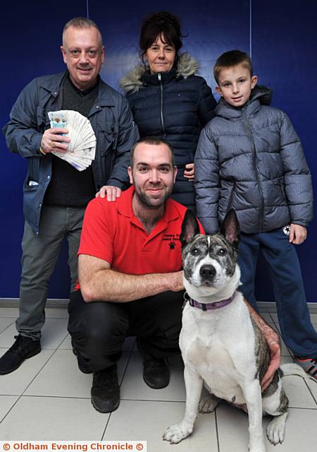 £1,585 presented to Pennine Pen Animal Rescue from Manchester Pug Army 'Pugmas Pawty'. Back (left to right): Chris Holden, Jakki Hope and Reece Hackin (from Manchester Pug Army). Front: Michael Waugh and Suki