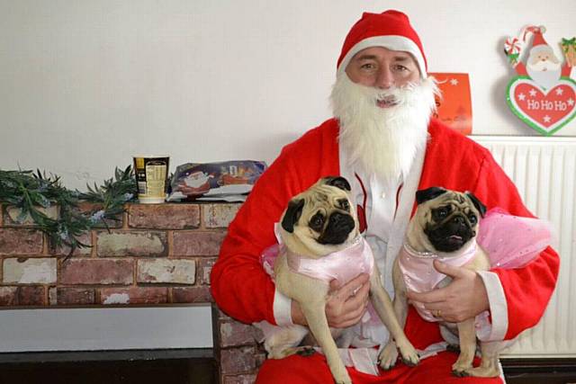 Pugs Grace and Hattie had the opportunity to meet santa Neil Barlow at the Manchester Pug Army event.