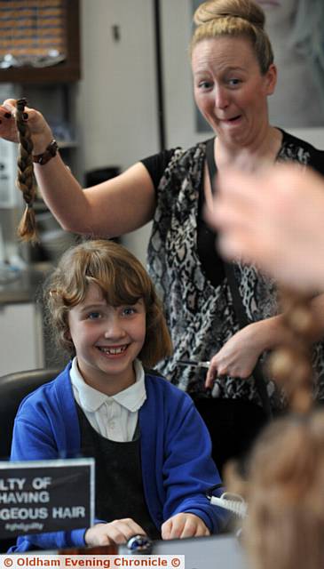 Too late now . . . Lucy with hairdresser Kim O'Connor