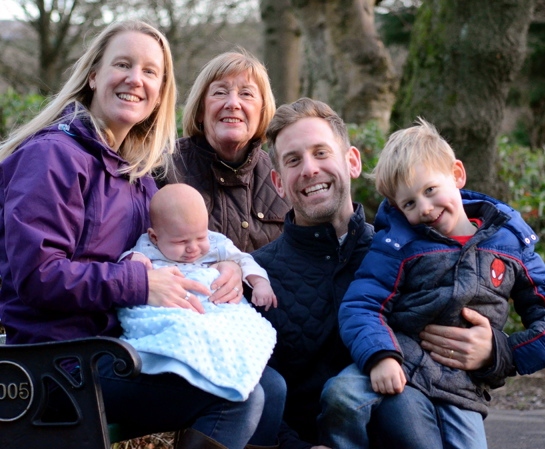 ALL smiles . . . Janice with daughter Jenny, son-in-law Lewis and grandchildren Reuben and Felix.
