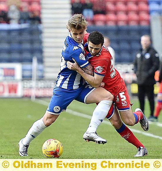 PUSH AND SHOVE: Daniel Lafferty (right) gets stuck in to a challenge.