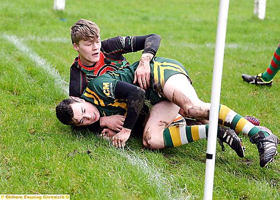 JUST REWARD . . . Callum Cashin crosses the try line for St Anne’s.