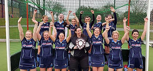 PLENTY TO CHEER ABOUT . . . trophy joy for Oldham second team