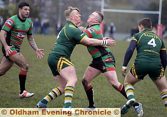 Waterhead Warriors (stripes) v Oldham St Annes

James Shaw of St Annes and Niall Dunnington-Wallcae of Watehead clash