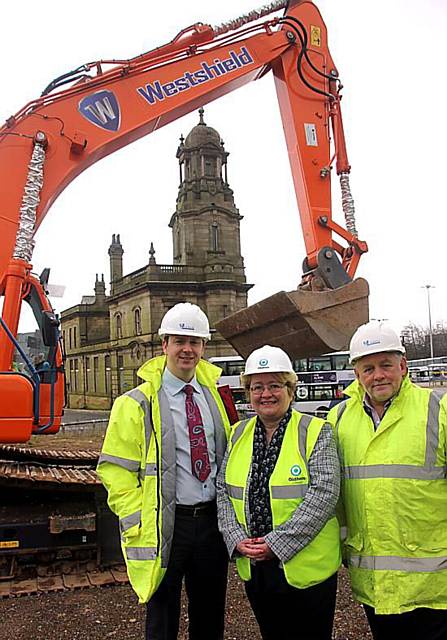 GET digging ... Oldham Council Leader Councillor Jean Stretton with Westshield Director Gerard Waldron, left, and Contracts Manager Brian Ashton at what will become the new Park and Ride site at Prince’s Gate