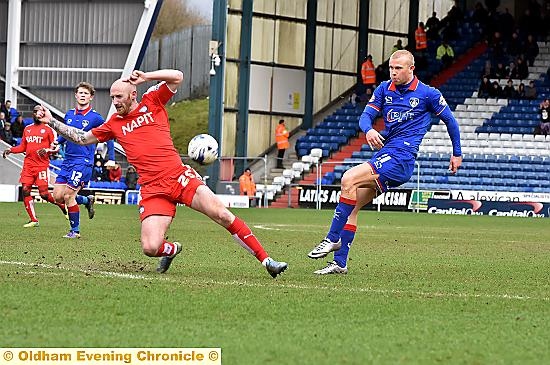 STRIKER Curtis Main tries to get a shot away.