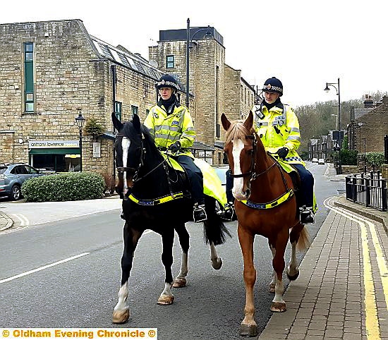 ALL geed up . . . police horses on Uppermill High Street